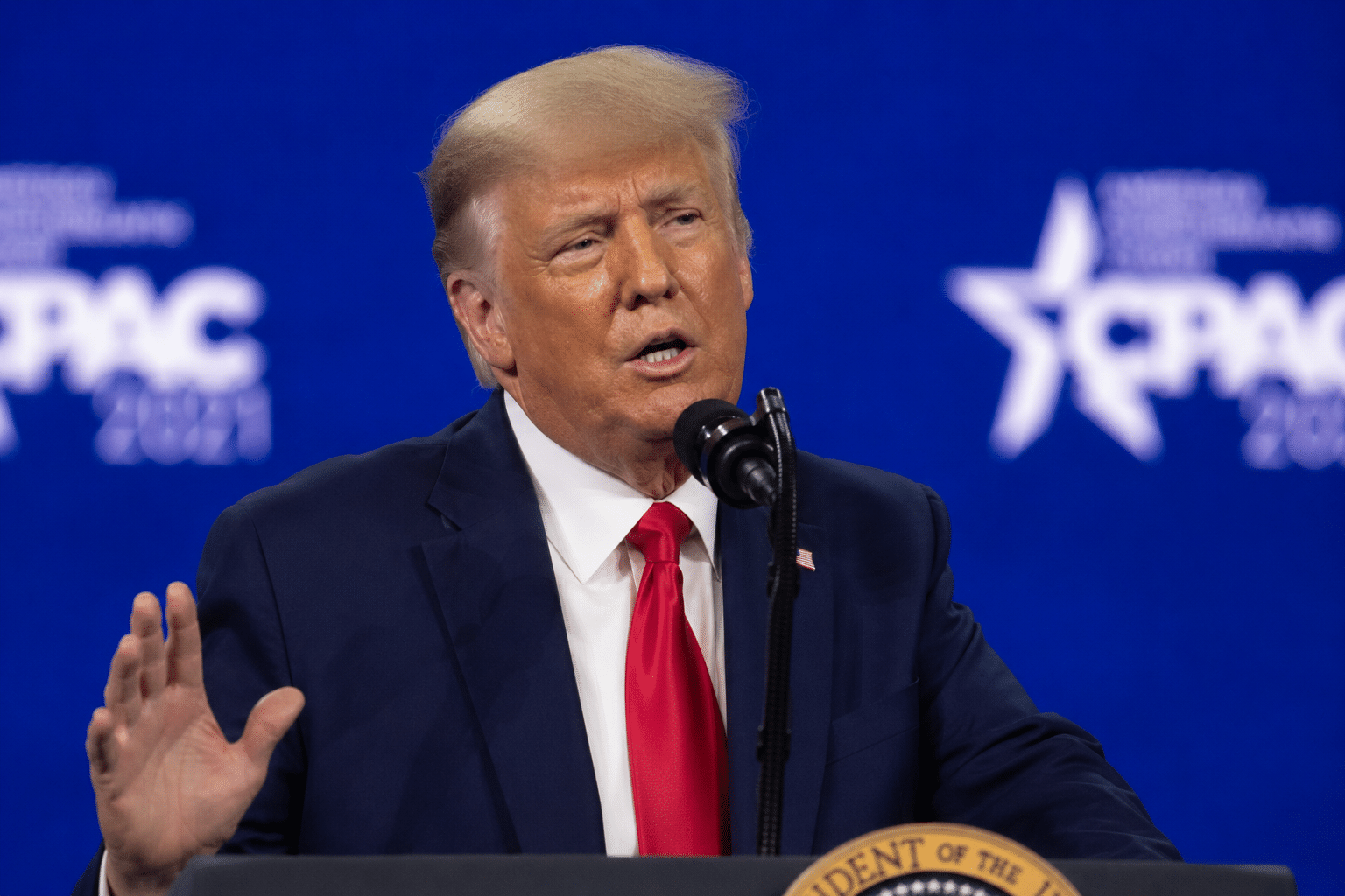 Donald Trump speaking at a conference